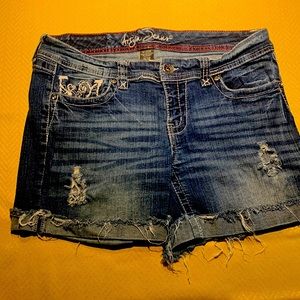 Distressed denim shorts
